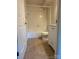 Clean bathroom featuring a shower-tub combination, tile floors, and single vanity at 9125 N Vicksburg Park Ct, Charlotte, NC 28210