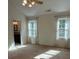 Serene main bedroom with neutral carpet, abundant natural light, and ensuite bathroom access at 9125 N Vicksburg Park Ct, Charlotte, NC 28210