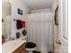 Cozy bathroom features a toilet and shower-tub combination with a neutral color scheme at 9337 Four Mile Creek Rd # 101, Charlotte, NC 28277