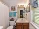 Cozy bathroom featuring a single sink vanity and shower-tub combination at 9337 Four Mile Creek Rd # 101, Charlotte, NC 28277