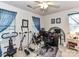 Spare bedroom equipped with exercise equipment and a dedicated desk space at 9337 Four Mile Creek Rd # 101, Charlotte, NC 28277