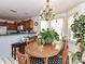 Charming dining area adjacent to the kitchen, perfect for Gathering meals at 9337 Four Mile Creek Rd # 101, Charlotte, NC 28277