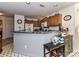 Kitchen with a breakfast bar, ideal for casual dining at 9337 Four Mile Creek Rd # 101, Charlotte, NC 28277
