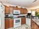 Well-equipped kitchen with appliances and wooden cabinetry at 9337 Four Mile Creek Rd # 101, Charlotte, NC 28277