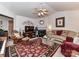 Well-decorated living room with fireplace, plush seating, and ample space at 9337 Four Mile Creek Rd # 101, Charlotte, NC 28277