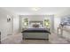 Comfortable bedroom features plush carpeting, a cozy bed, abundant natural light, and stylish decor at 10111 Snowbell Ct, Charlotte, NC 28215