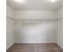 Spacious walk-in closet with wire shelving provides ample storage space at 10111 Snowbell Ct, Charlotte, NC 28215