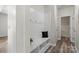 Mud room featuring white bench with storage and hooks at 10111 Snowbell Ct, Charlotte, NC 28215