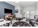 Versatile bonus room with stylish furnishings, including accent furniture, art, and decor at 10203 Loch Lomond Dr, Charlotte, NC 28278