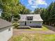 View of the back of the house with the patio area at 1025 Old Us 80 Hwy, Gold Hill, NC 28071