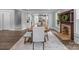 Bright dining room featuring wood floors, an open floorplan, and a wooden table with seating at 1025 Old Us 80 Hwy, Gold Hill, NC 28071