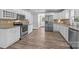 Well-equipped kitchen featuring stainless steel appliances, granite countertops, and white cabinets at 1025 Old Us 80 Hwy, Gold Hill, NC 28071