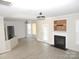 Spacious living room showcasing wood floors and a cozy fireplace at 10615 Elm Bend Dr, Charlotte, NC 28273