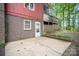 Exterior back view featuring a brick foundation and porch with wooden lattices at 110 Hidden Valley St, Cherryville, NC 28021