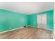 Bright bedroom with wood flooring and ample natural light at 110 Hidden Valley St, Cherryville, NC 28021