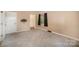 Cozy bedroom with plush carpet, neutral walls, and a convenient closet entrance at 110 Hidden Valley St, Cherryville, NC 28021