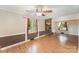 Comfortable living room with a brick fireplace, built-in shelving, and natural light at 110 Hidden Valley St, Cherryville, NC 28021