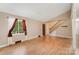 Spacious living room with vaulted ceilings, hardwood floors, and a staircase at 110 Hidden Valley St, Cherryville, NC 28021