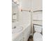 Well-lit bathroom with vanity, toilet, and built-in storage at 124 Island Park Ln, Statesville, NC 28625