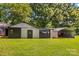 View of backyard and metal outbuildings, providing ample storage space at 124 Island Park Ln, Statesville, NC 28625