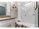 Modern bathroom with glass enclosed shower and sleek fixtures, white subway tile at 126 Longwood Rd # 52, Mooresville, NC 28115