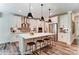 Gourmet kitchen with a large island, pendant lighting, stainless steel appliances, and custom cabinetry at 126 Longwood Rd # 52, Mooresville, NC 28115