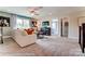 Spacious living room with large windows, plush seating, and stylish decor at 126 Longwood Rd # 52, Mooresville, NC 28115
