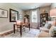 Comfortable home office with natural light, a desk, chair, bookshelves, and decor at 126 Longwood Rd # 52, Mooresville, NC 28115