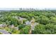 Aerial view of a modern home with city skyline in the background at 129 French St, Charlotte, NC 28216