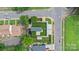 Stunning aerial view of modern home featuring a backyard with artificial turf and stylish patio space at 129 French St, Charlotte, NC 28216