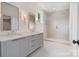 Modern bathroom boasts double vanity, marble countertops, and a glass-enclosed shower at 129 French St, Charlotte, NC 28216