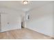 Bright bedroom featuring hardwood floors, white walls, natural light and a modern style at 129 French St, Charlotte, NC 28216