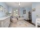 Light and airy bedroom with a crib, changing table, and ample natural light at 139 Palaside Ne Dr, Concord, NC 28025