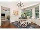 Bright breakfast nook featuring a round table, bay window, and view to Gathering room at 139 Palaside Ne Dr, Concord, NC 28025