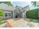 Backyard featuring a stone patio perfect for outdoor living and entertaining at 14533 Holly Springs Dr, Huntersville, NC 28078