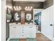 Bathroom featuring double sinks, granite countertop, and opens to the primary bedroom at 14533 Holly Springs Dr, Huntersville, NC 28078