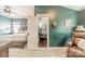 The primary bedroom features ensuite office space and is decorated with neutral colors at 14533 Holly Springs Dr, Huntersville, NC 28078