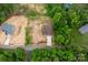 Aerial view of new construction home on large lot surrounded by mature trees at 1471 Marshbrooke Ln, Catawba, NC 28609