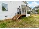 Low angle view of the back deck, stairs, and siding of this home at 1471 Marshbrooke Ln, Catawba, NC 28609