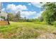 Large, expansive backyard with a freshly seeded lawn backing up to a wooded area at 1471 Marshbrooke Ln, Catawba, NC 28609