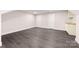 Spacious finished basement features two doors, bright lighting, and sleek flooring at 1471 Marshbrooke Ln, Catawba, NC 28609