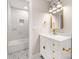 A stylish bathroom includes a white vanity with gold hardware and geometric patterned floors at 1471 Marshbrooke Ln, Catawba, NC 28609