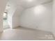 Bright bedroom with neutral carpet and walls, offering a clean and adaptable space at 1500 Lookout Cir, Waxhaw, NC 28173