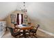 Upstairs game room with stylish chandelier and octagonal poker table perfect for Gathering fun and games at 1500 Lookout Cir, Waxhaw, NC 28173