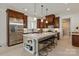 Spacious kitchen features a large island, stainless steel appliances, and wood cabinets at 1500 Lookout Cir, Waxhaw, NC 28173