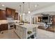 Modern kitchen with large island, stainless steel appliances, and open concept living area at 1500 Lookout Cir, Waxhaw, NC 28173