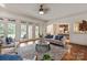 Spacious living room with French doors, an open floor plan, and stylish furnishings at 1500 Lookout Cir, Waxhaw, NC 28173