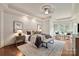 Spacious main bedroom with plush bedding, bay windows, and modern decor at 1500 Lookout Cir, Waxhaw, NC 28173