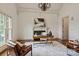 Bright office with fireplace, large window, hardwood floors, and stylish decor at 1500 Lookout Cir, Waxhaw, NC 28173
