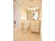 Bathroom featuring a tub, toilet, sink, mirror, and tiled floor at 153 Perrin Pl, Charlotte, NC 28207